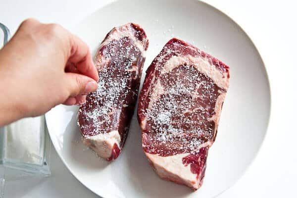 What are some tricks to tenderize steak?