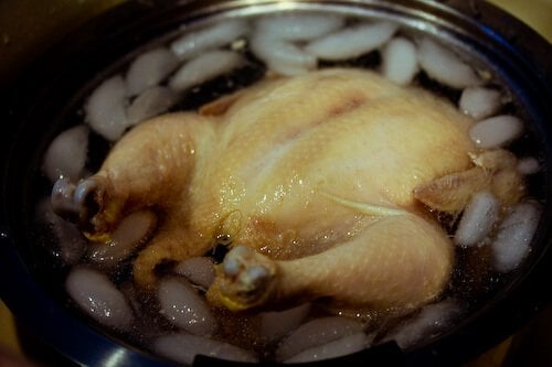 Hainanese Chicken Rice Recipe - Plunge chicken in ice bath
