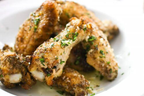 Baked wings on a white plate