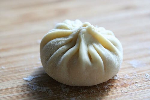 steamed bun on table