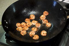 stir frying shrimp for Shrimp and Zucchini Stir Fry and Crispy Basil