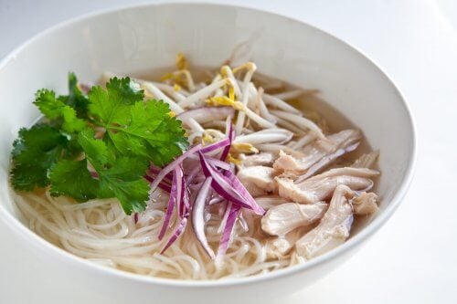 slow cooker pho in a white bowl