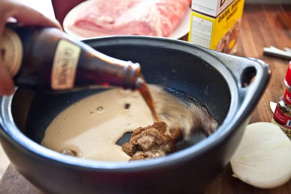 pouring Guinness in pot