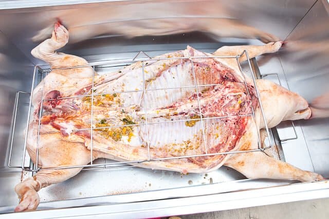 Roasting a Whole Pig using a Wired Thermometer - La Caja China