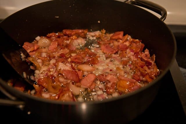 Cooked bacon and onions to add to the potato salad