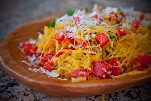 Cook spaghetti squash in the microwave - tomatoes, basil, parmesan