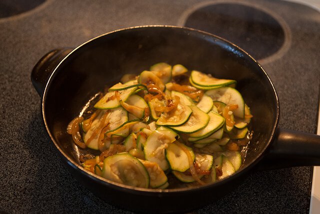 cooking onion and zucchini for Zucchini Frittata Recipe