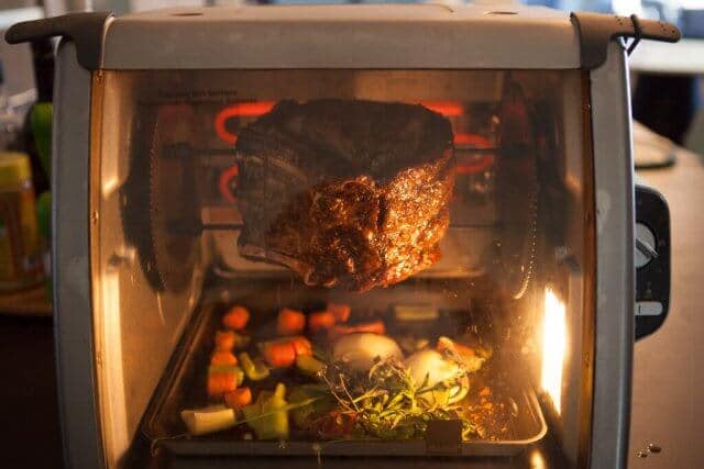 Prime Rib Roast Recipe - Rotiserrie with meat and veggies