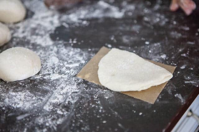 chinese steamed buns on parchment