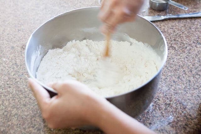 stirring flour for potsticker dumpling wrappers