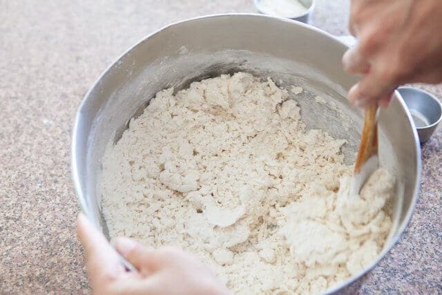 top down shot of stirring flour mix