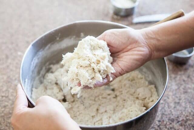 hand holding flour mix