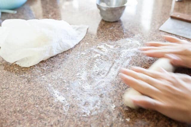 rolling a line of dough