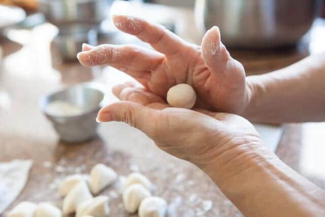 rolling small ball of dough