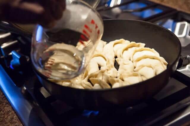 pouring water in pan