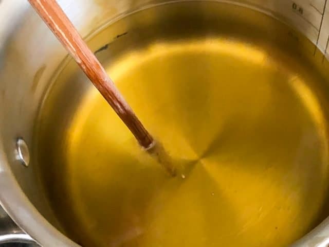 chopstick in pot of oil 