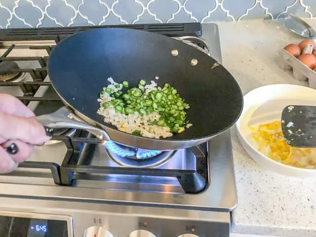 https://steamykitchen.com/wp-content/uploads/2018/09/scanpan-ctx-wok-review-0405-640x480.jpg.webp