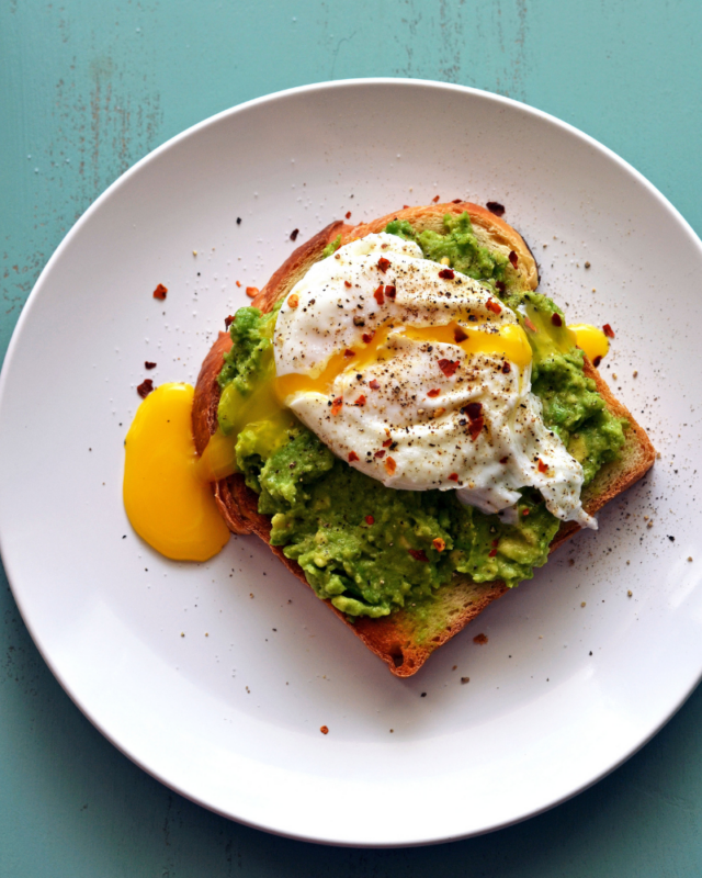 one poached egg on an avocado toast.