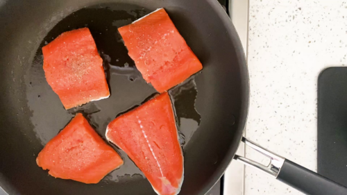 seared salmon in a pan