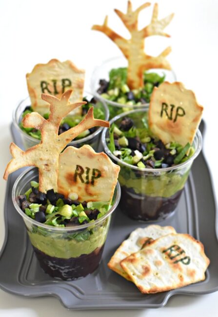 This frightening graveyard taco cups recipe comes to us from Fork and Beans.
