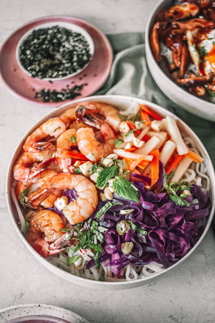Top View of the Vietnamese Shrimp Noodle Bowl with side dishes 