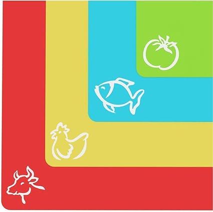 Set of four vibrant cutting mats in red, yellow, blue, and green, each featuring a white food icon: a cow on red, a chicken on yellow, a fish on blue, and a tomato on green.
