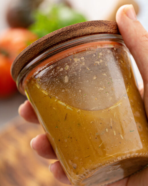 Smoky Sofrito Vinaigrette successful  mason jar and woody  lid successful  hand