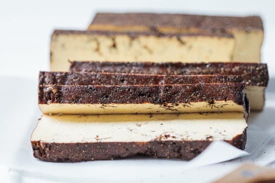 Sliced Smoked Tofu on paper and white background