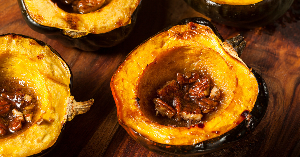 Cooked acorn squash with brown sugar and pecans