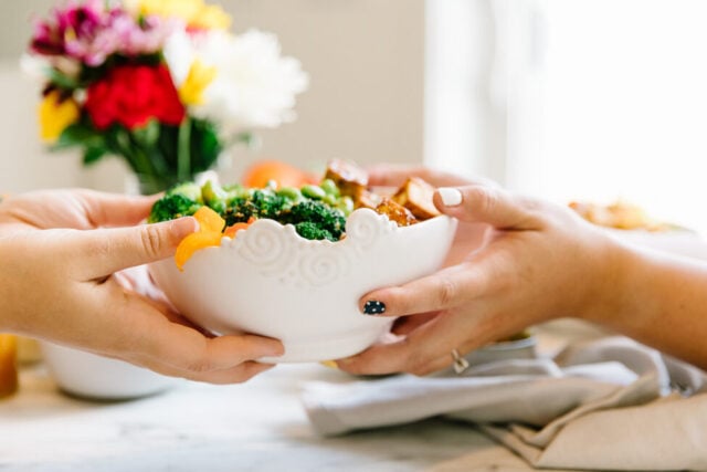 Handing over a Buddha Bowl