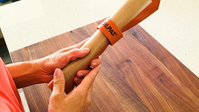 Silpat's Sil Band for rolling up your mats