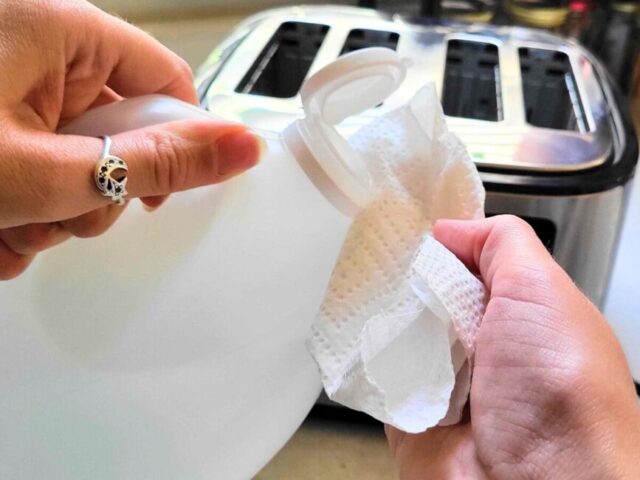 Putting vinegar on a rag