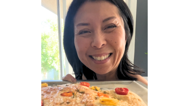 Jaden with her pizza